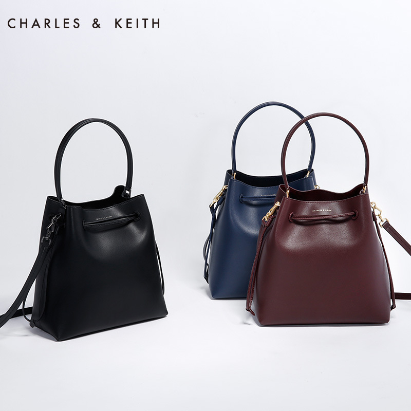 CNK 單肩包 CK2-20780136 新品女包復古抽帶斜挎大包批發・進口・工廠・代買・代購
