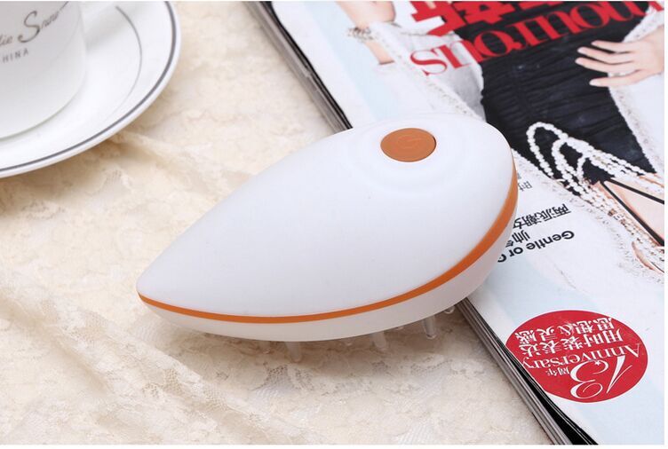 頭部按摩器 手持迷你按摩梳按摩刷頭部震動按摩器工廠,批發,進口,代購